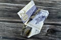 Crumpled Saudi Arabia money of 20 SAR twenty riyals with G20 summit logo, photo of king Salman, world map, wrinkled cash bill Royalty Free Stock Photo