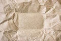 Crumpled sheet of packing beige paper Royalty Free Stock Photo