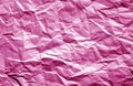Crumpled sheet of paper with blur effect in pink color Royalty Free Stock Photo