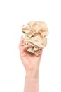 Crumpled sheet of paper in female hand on white Royalty Free Stock Photo