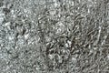 Crumpled and shiny sheet of aluminum foil texture for background Royalty Free Stock Photo