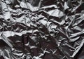 Crumpled silver aluminum foil closeup background texture. Abstract metallic paper holographic pattern Royalty Free Stock Photo