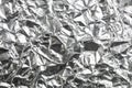 Crumpled silver aluminum foil surface texture background closeup Royalty Free Stock Photo