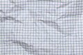 Crumpled squared white paper sheet Royalty Free Stock Photo