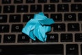 Crumpled sticky note on keyboard. Blue crumpled post it Royalty Free Stock Photo