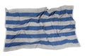 Crumpled striped beach towel isolated on white, top view Royalty Free Stock Photo