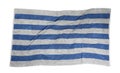 Crumpled striped beach towel isolated on white, top view Royalty Free Stock Photo