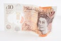 A crumpled ten pound note