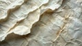 Crumpled, textured, aged paper background with small specks Royalty Free Stock Photo