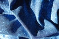 Crumpled shiny electric blue lurex fabric Royalty Free Stock Photo