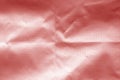 Crumpled transparent plastic surface in red color Royalty Free Stock Photo