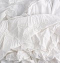 Crumpled white cotton fabric, fabric for sewing clothes and shirts Royalty Free Stock Photo