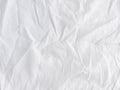 Crumpled white cotton fabric, fabric for sewing clothes and shirts Royalty Free Stock Photo