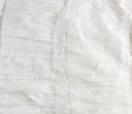 Crumpled white cotton fabric, fabric for sewing Royalty Free Stock Photo