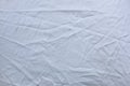 Crumpled White Fabric with Creases for Texture Background Royalty Free Stock Photo