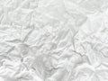 Crumpled white paper is old background. Blank white wrinkled paper sheet.