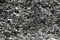 Crumpled wrinkled silver foil texture. Rumpled dark silver foil texture background Royalty Free Stock Photo