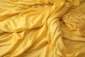 Crumpled yellow bed linen