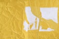 Crumpled yellow mail envelope, top view. Abstract background.