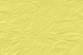 crumpled yellow paper background