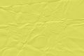 crumpled yellow paper background