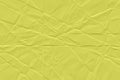 crumpled yellow paper background