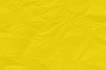 crumpled yellow paper background