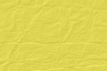 crumpled yellow paper background