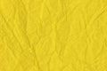 Crumpled yellow paper, bright yellow. Your background for design