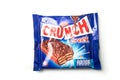 Crunch chocolate bar with puffed rice by nestle company in a blue packaging on white background