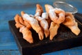 Crunchy brushwood cookies dusted with sugar powder