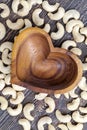crunchy cashew nuts in a heart-shaped bowl Royalty Free Stock Photo
