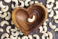 crunchy cashew nuts in a heart-shaped bowl Royalty Free Stock Photo