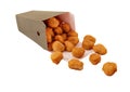 Crunchy chicken popcorn bites in carton container for fast food meals isolated on white background Royalty Free Stock Photo