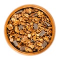 Crunchy chocolate granola in wooden bowl Royalty Free Stock Photo