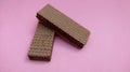Crunchy chocolate wafers isolated on pink background Royalty Free Stock Photo