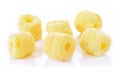 Crunchy corn snacks on a white background