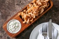 Thai spicy tender pork barbecue skewers with grill pineapple and Papadum crispy chips in glass plate Royalty Free Stock Photo