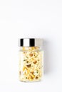 Crunchy Diet Mixture in a glass jar with closed lid, made with Puffed Rice, Corn Flakes, and Curry leaves.