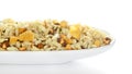 Crunchy Diet Mixture in a white ceramic oval bowl made with Puffed Rice Corn Flakes and Curry leaves.