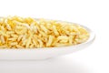 Crunchy Lemon Bhel in a white ceramic oval bowl made with Puffed Rice small besan sev.