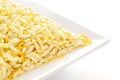 Crunchy Lemon Bhel in a white ceramic square plate made with Puffed Rice small besan sev.