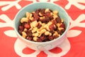 A crunchy mixture of nuts, walnuts, peanuts, raisins, almonds