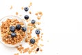 Crunchy muesli and blueberry Breakfast cereals isolated on white background, selective focus, top view