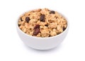 Crunchy oat granola cereal with dried fruits in white bowl