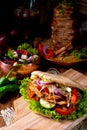 Crunchy pita with grilled gyros meat. Various vegetables and gar