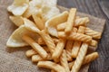 Crunchy prawn crackers or shrimp crisp rice and ketchup for traditional snack - prawn crackers stick on sack and wooden table