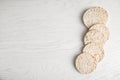 Crunchy rice cakes on white wooden background, top view. Royalty Free Stock Photo