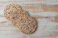 Crunchy rice cakes on white wooden table. Food background Royalty Free Stock Photo