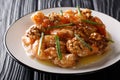 Crunchy shrimp with honey, candied walnut, and sweet mayo close-up. horizontal Royalty Free Stock Photo